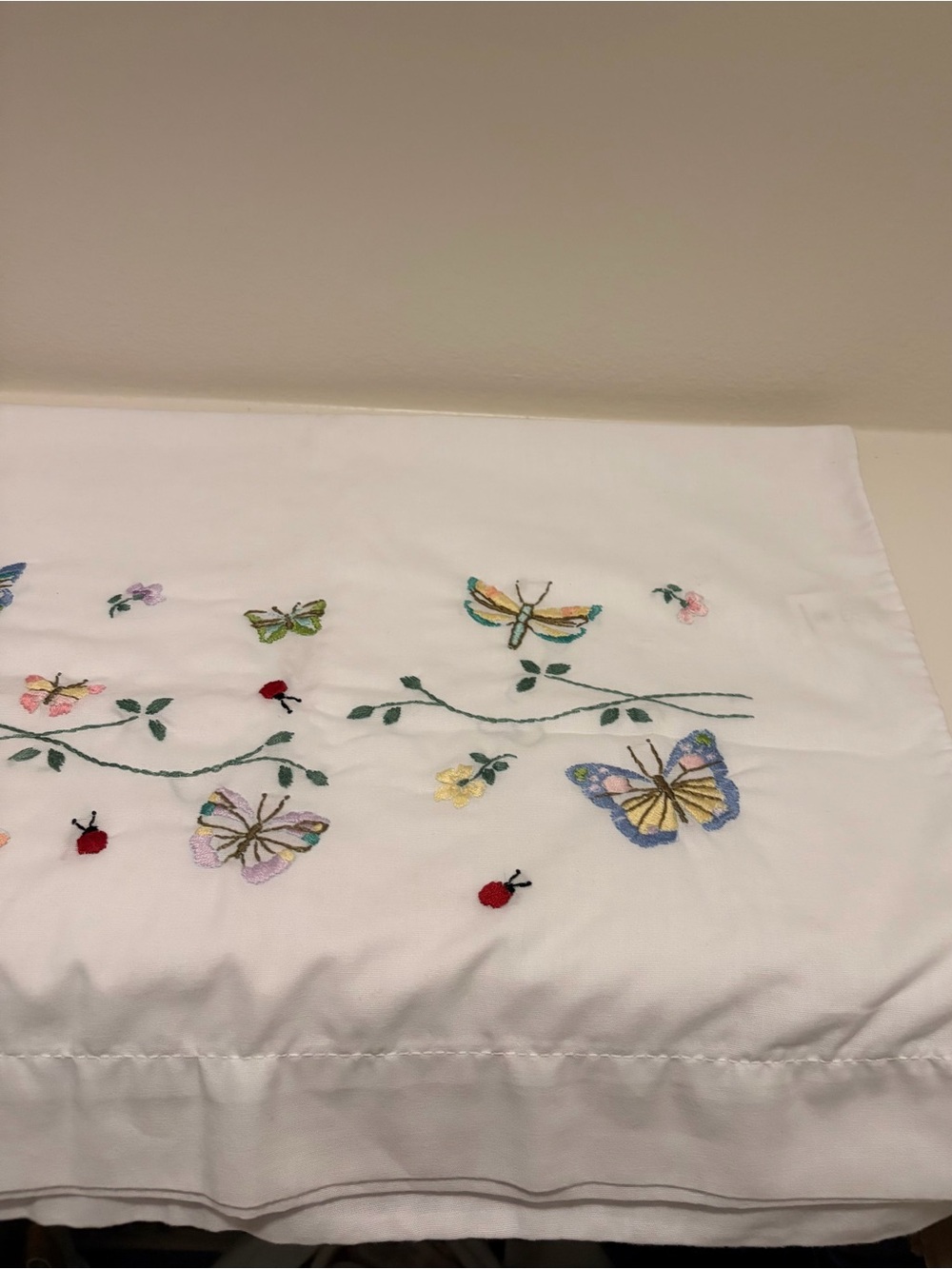 Vintage Embroidered White Standard Pillowcases Butterflies In Flight by Bucilla